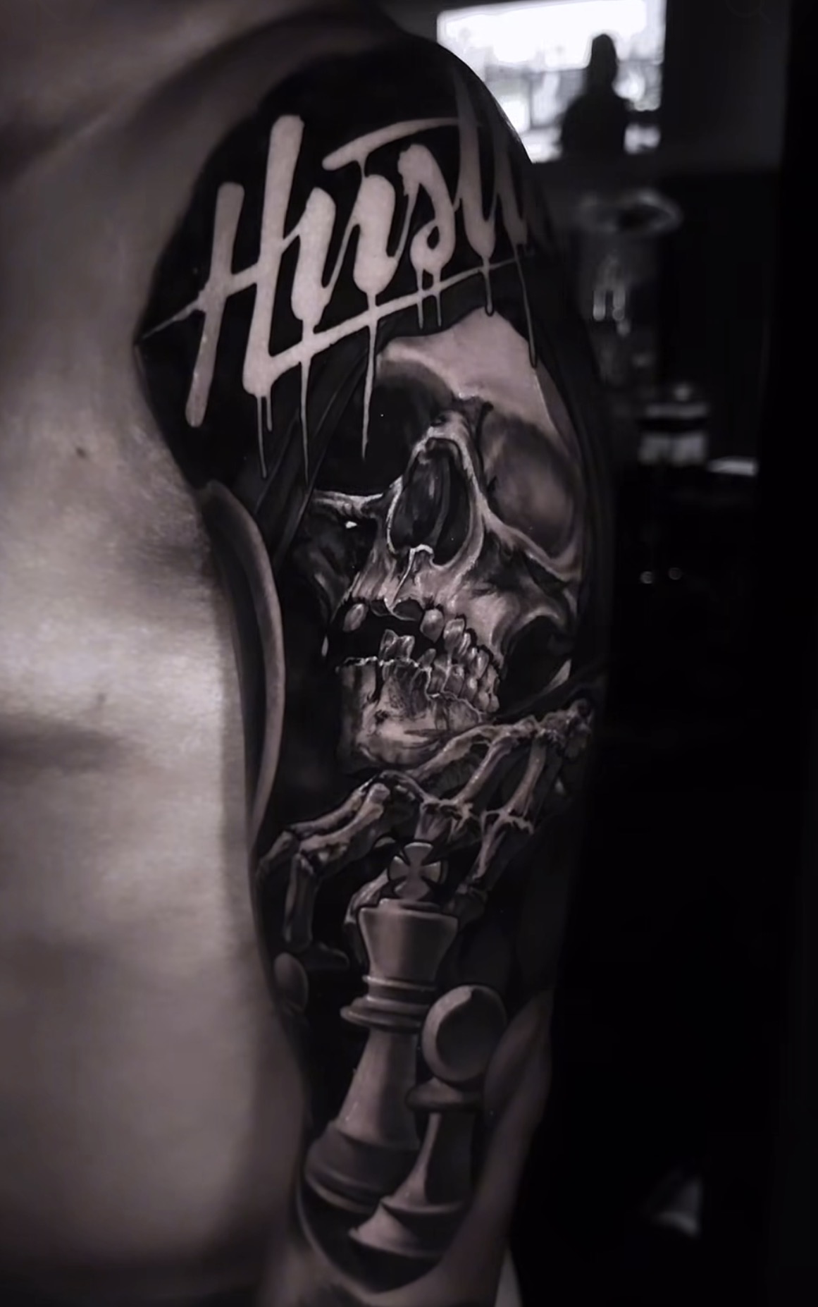 Black and grey skull tattoo