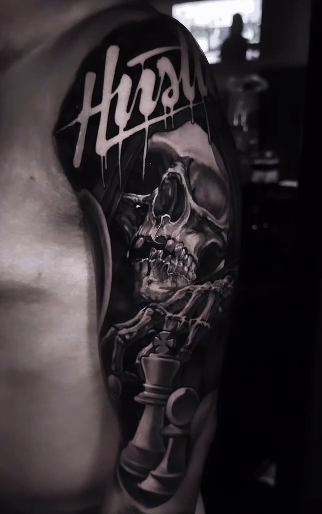 Black and grey skull tattoo