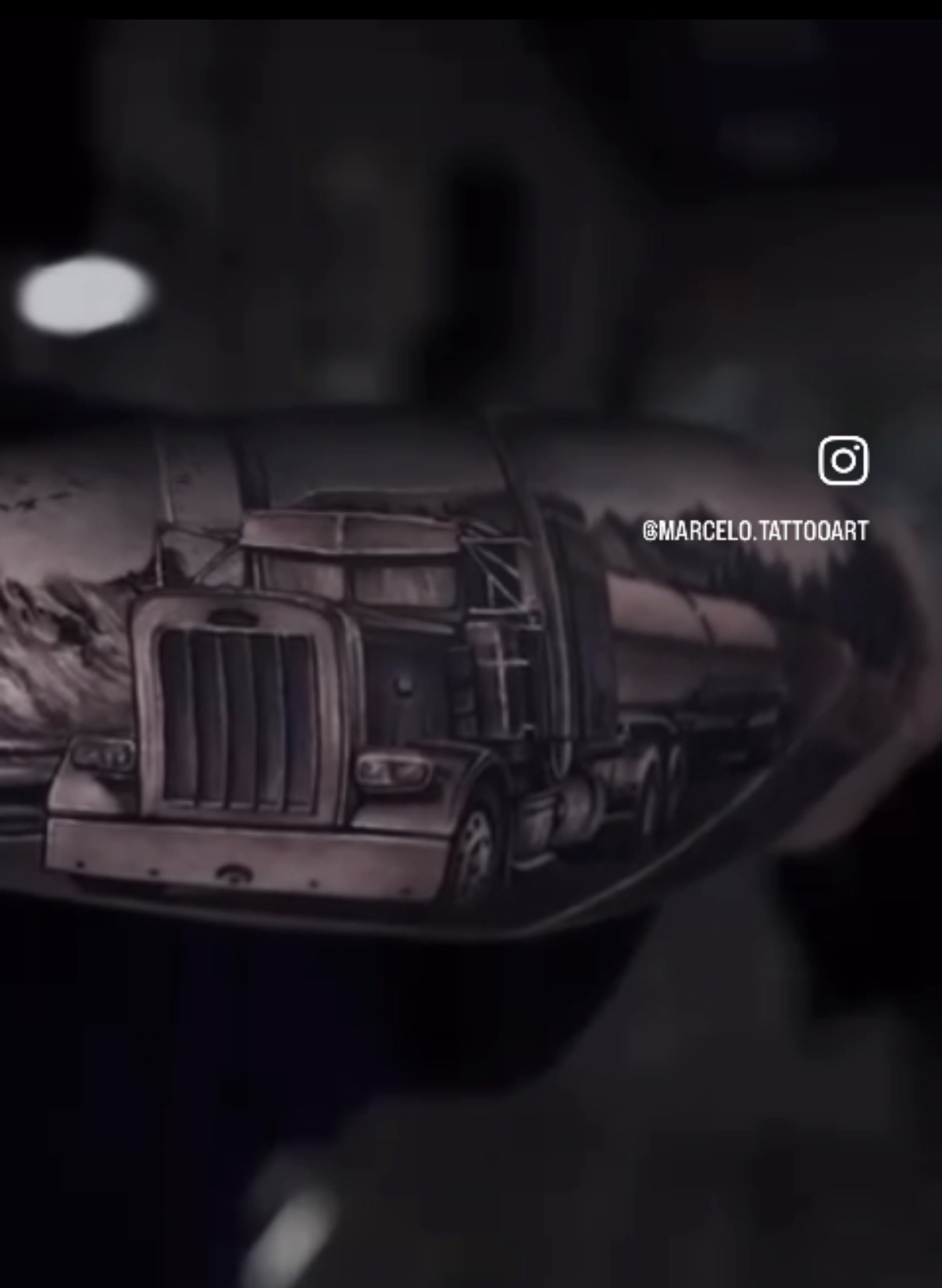 Black and grey truck tattoo