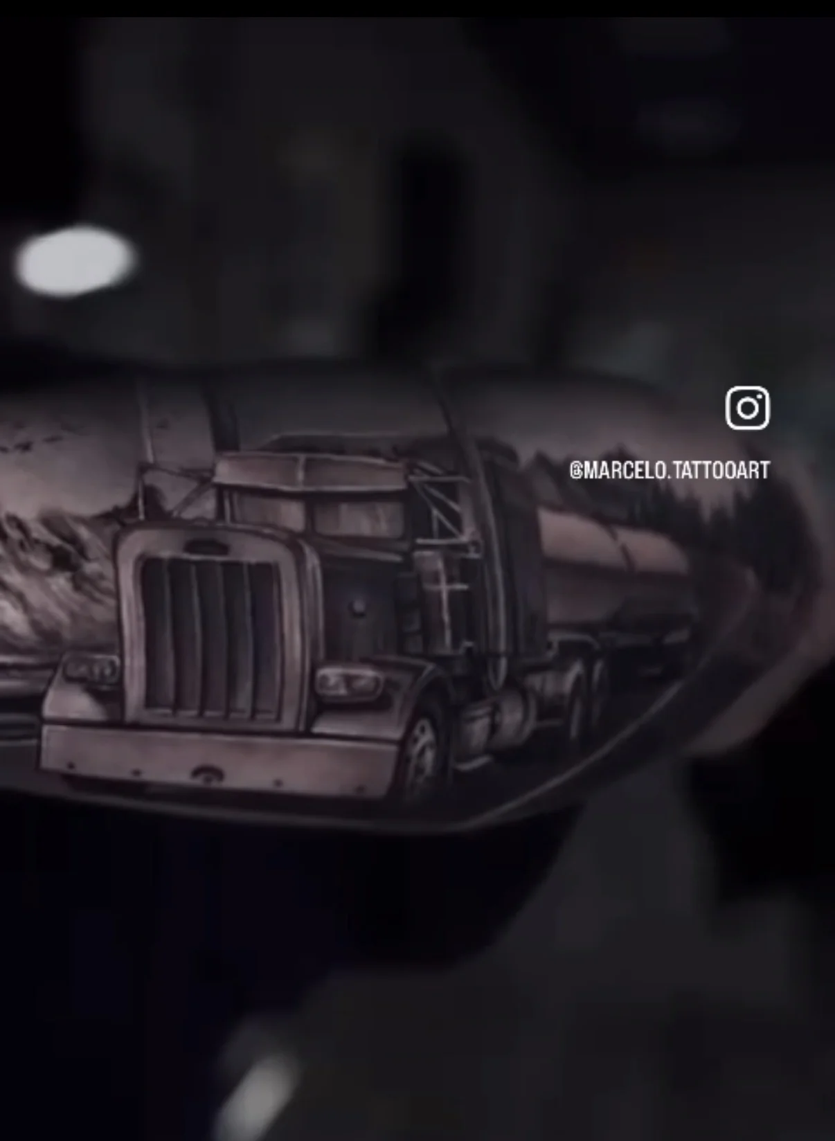 Black and grey truck tattoo
